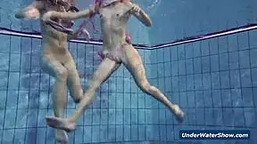 Horny girls strip each other in the pool, don't they?