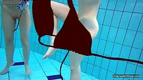 Look At These Two Hot Lesbians In The Pool, Shaved And Sexy With Natural Tits Underwater!