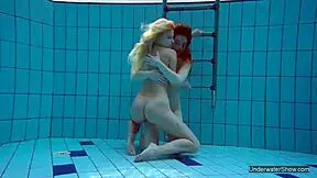 Look At These Two Hot Lesbians In The Pool, Shaved And Sexy With Natural Tits Underwater!