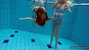 Look At These Two Hot Lesbians In The Pool, Shaved And Sexy With Natural Tits Underwater!