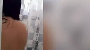 cute latina showering in webcam with tattoo and tits