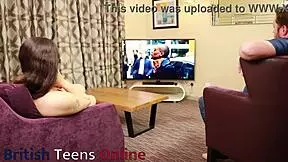 British 19-year-old gives oily handjob to older boyfriend on couch, leading to cum-covered orgasm and fucking.