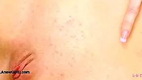 blonde babe relaxes on sofa after beach