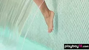 The petite blondie Lindsey Pelas slowly reveals her massive natural boobs in an outdoor striptease scene