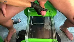 Mature Milf Delivers Explosive Handjob Cumshot Right in the Aquarium!