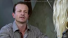 Petite blonde cleans up after an intimate moment.