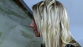 Petite blonde cleans up after an intimate moment.