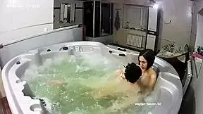 young lesbians bathe and finger in jacuzzi