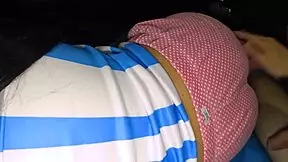 Young woman receives close-up attention in homemade camping video.