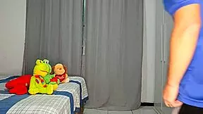 He hides behind the bedroom curtain to see his new stepdaughter naked, focusing on her brunette teen body