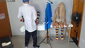 doctor intensely examines two half-sisters