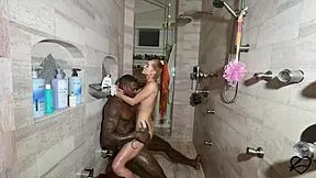 Gym Coach Assists Client in Intense Workout Session