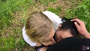 Amateur threesome blowjob outdoors with sloppy sucking.