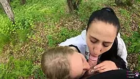 Amateur threesome blowjob outdoors with sloppy sucking.