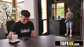 Married woman in fishnets at the wedding reception chats with a young man