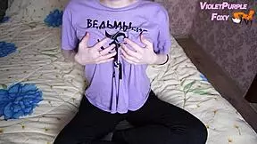 Petite blonde student enjoys a quiet solo moment in her homemade room