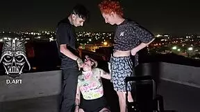 A young girl casually gives to two gifted men on the roof for free