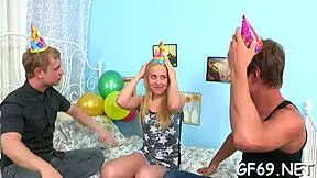 Delightsome darling shares her attention with two guys.