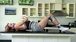 Bound indian teen blonde teased on countertop in college, moaning in bondage. Desire builds intensely.