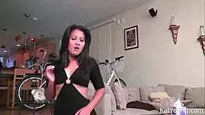 kat dances sexy in black dress and thong