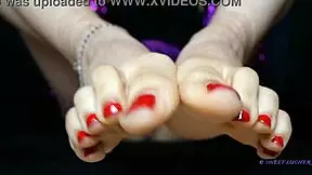 Small feet mistress with red toenail polish dominates sensually, sweat glistening