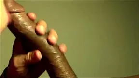 The Beautiful Cougar Engages In Oral Activity With A Young Black Man In Close Up