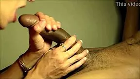 The Beautiful Cougar Engages In Oral Activity With A Young Black Man In Close Up