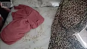 Old man shares bed with visitor