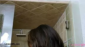 elegant tall brunette took a shower