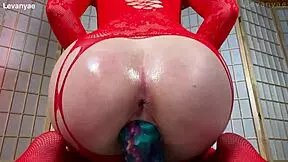 Stretching my shaved pussy with a huge fantasy monster dildo in red bodystocking.