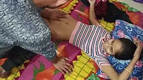 Lonely indian housewife sits on sofa