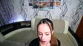 Cute babe in lingerie teases with playful fingering