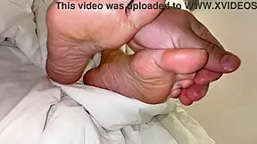 the most cute and beautiful feet ever get massage in best new york salon, close up view.