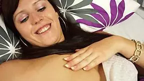 Innocent brunette teen feels naughty pleasure in her bedtime solo orgasm