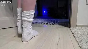 Delicate legs in sneakers are waiting for you