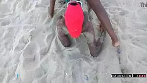 Young couple engages in wet foreplay and sex on the beach with friends watching