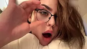 Hot brunette with glasses and big ass gets a facial from pov