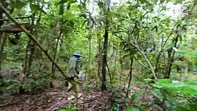 thai girl walks and talks while picking mushrooms in the deep forest