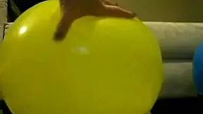 Sophie masturbates with balloons in the living room and bathroom, fingering her wet pussy
