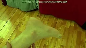 Fifi Foxx Gives Handjob Against Wall