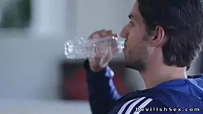 dark haired teen athlete talks to her coach about training and fitness