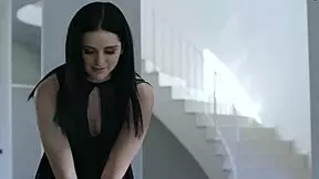 dark haired teen athlete talks to her coach about training and fitness