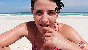 skinny african brunette with short hair and big ass gives deepthroat blowjob on beach ending with facial in front of bathers 😈