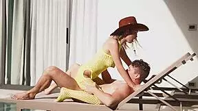 A cowboy girl boldly saddles the stallion