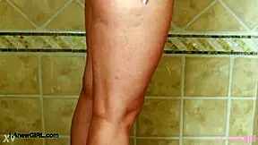 captivating blonde model enjoys a shower 😊