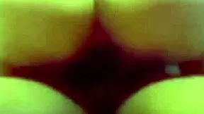 hottie rubs her pussy while riding a big dick.