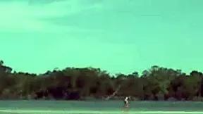 Guy in lingerie fucks teen's ass then removes condom to cum in her mouth during outdoor session