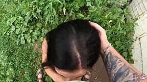 horny student gives blowjob behind garages?