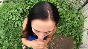 horny student gives blowjob behind garages?