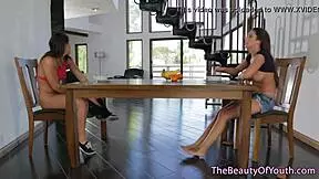 A teen lesbian gets her pussy licked by a milf stepmom